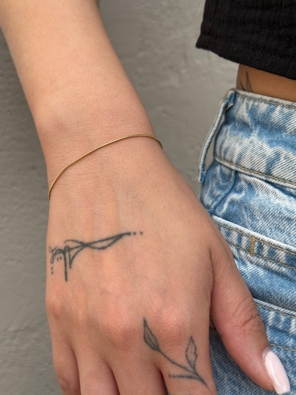 Golden whisper armband