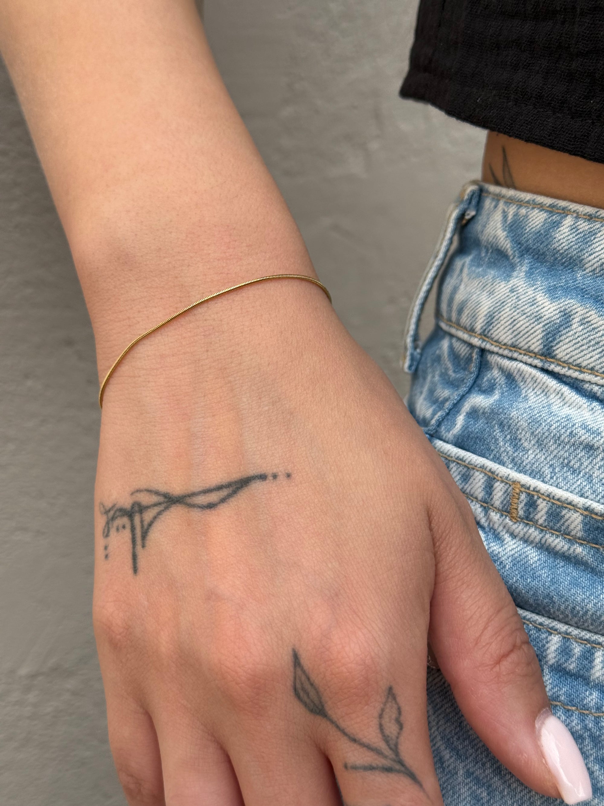 Golden whisper armband